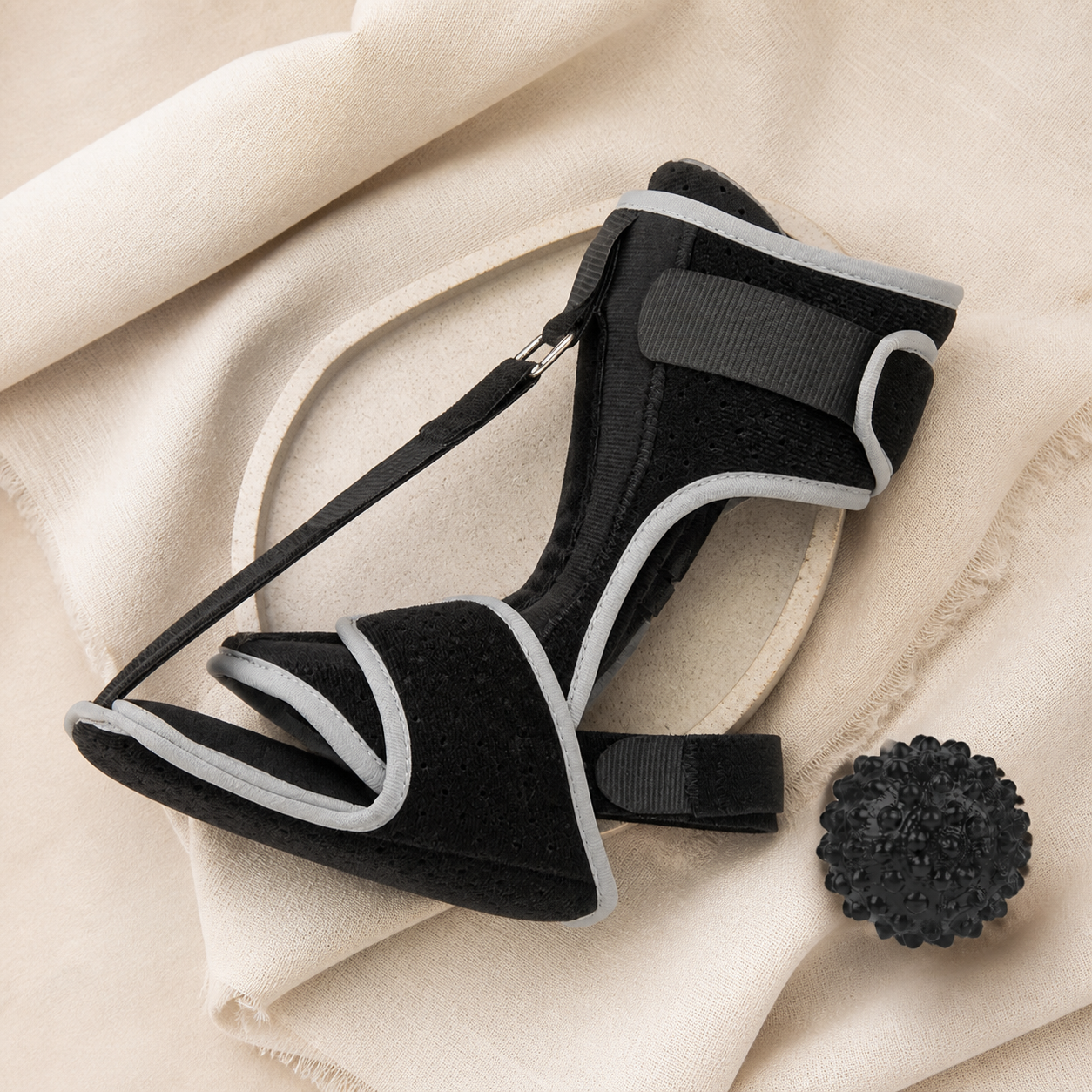 First Step Soft Night Splint paired with a textured massage ball